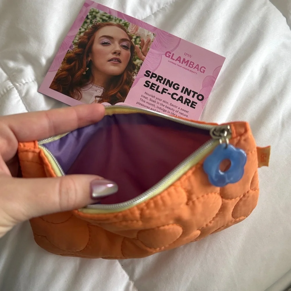 NWT April Ipsy Glam Bag! Orange Quilted Pouch with Blue Flower Charm